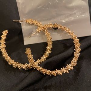 Gold color hoop earrings. Brand new